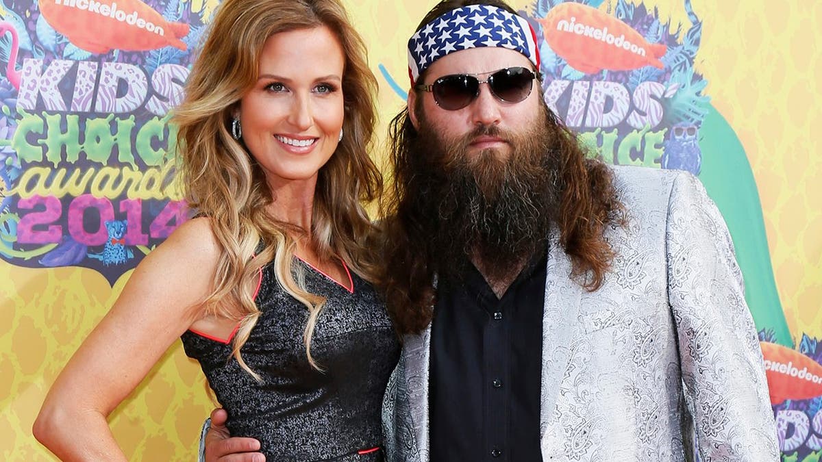 Willie Robertson and Korie Robertson arrive at the 27th Annual Kids' Choice Awards in Los Angeles, California March 29, 2014.