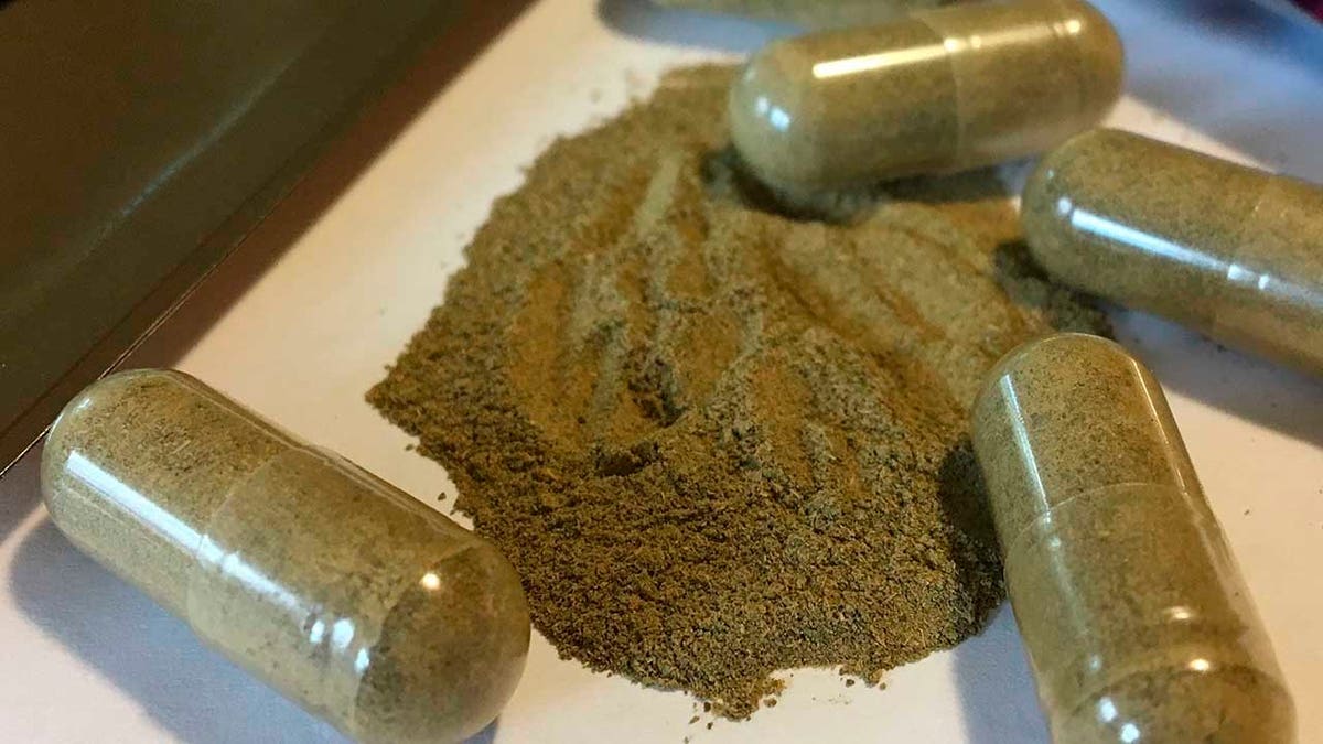 FILE - In this Sept. 27, 2017, file photo, kratom capsules are displayed in Albany, N.Y.  U.S. health authorities are ordering a Las Vegas company to pull its herbal supplements off the market because some of its products tested positive for salmonella, part of a nationwide outbreak linked to the ingredient kratom. The Food and Drug Administration said Tuesday, April 3, 2018,  it took the rare step of ordering the recall because Triangle Pharmanaturals refused to cooperate with regulators.   Sold in various capsules and powders, kratom has gained popularity in the U.S. as an alternative treatment for pain, anxiety and drug dependence. (AP Photo/Mary Esch, File)