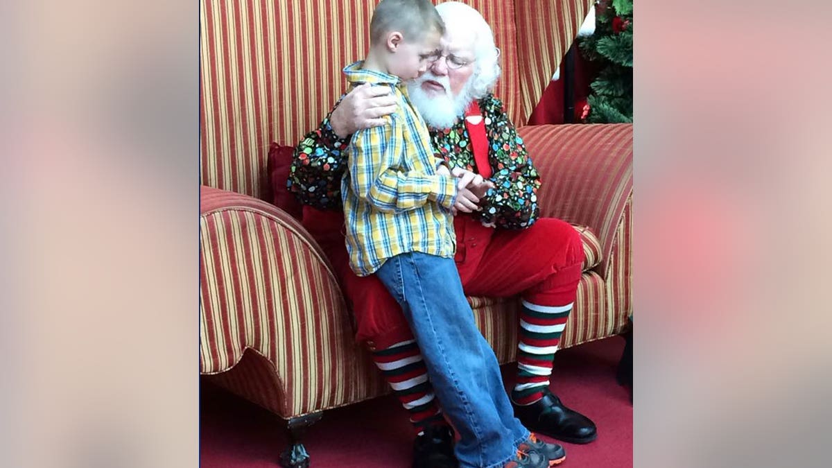 autistic boy with santa