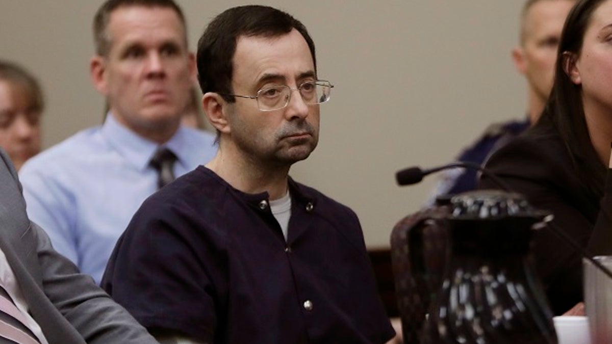 FILE - In this Wednesday, Jan. 24, 2018 file photo, Larry Nassar sits during his sentencing hearing in Lansing, Mich. Nassar, a 54-year-old former doctor for USA Gymnastics and member of Michigan State's sports medicine staff, admitted to molesting athletes while he was supposedly treating them for injuries. Nassar was the U.S. national teamâs doctor from 1995 to 2015. (AP Photo/Carlos Osorio, File)