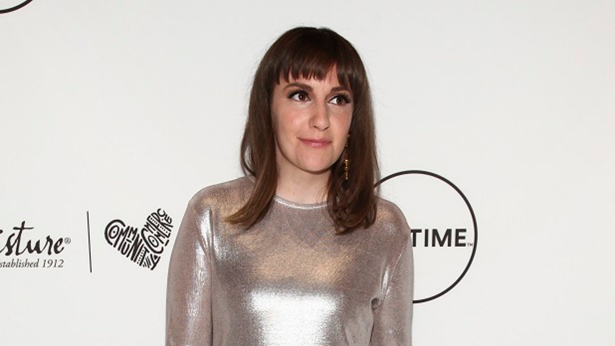 FILE - In this April 21, 2017 file photo, Lena Dunham attends Variety's Power of Women event in New York. Dunham has written an incredibly personal essay about coming to terms with permanent infertility at age 31. Vogue.com published Dunhamâs detailed account Wednesday of her decision to undergo a hysterectomy late last year to relieve what she describes as debilitating pain from endometriosis. (Photo by Andy Kropa/Invision/AP, File)