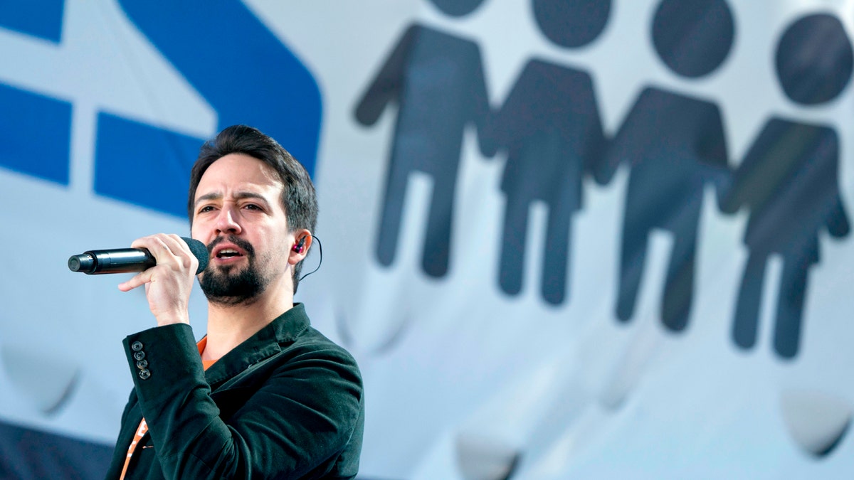 FILE - In this March 24, 2018 file photo, Lin-Manuel Miranda performs "Found Tonight" during the "March for Our Lives" rally in support of gun control in Washington. Miranda thought he had a migraine. But the Broadway star says it????????s really shingles. Miranda tweeted on Thursday, April 6, the diagnosis was caught early, but he????????s been quarantined from his 8-week-old son. (AP Photo/Andrew Harnik, File)