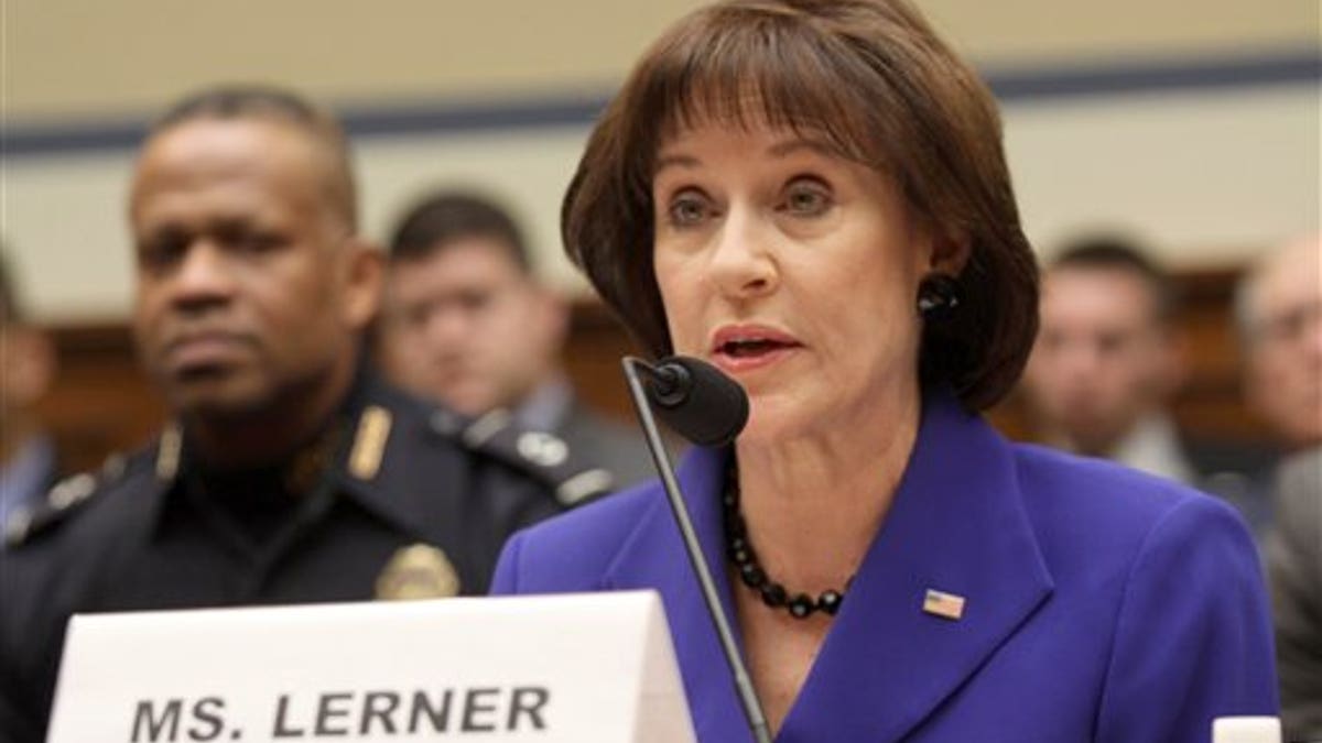 FILE - This March 5, 2014 file photo shows former Internal Revenue Service (IRS) official Lois Lerner on Capitol Hill in Washington. IRS employees erased computer backup tapes a month after officials discovered that thousands of emails related to the tax agency's tea party scandal had been lost, according to government investigators. (AP Photo/Lauren Victoria Burke, File)