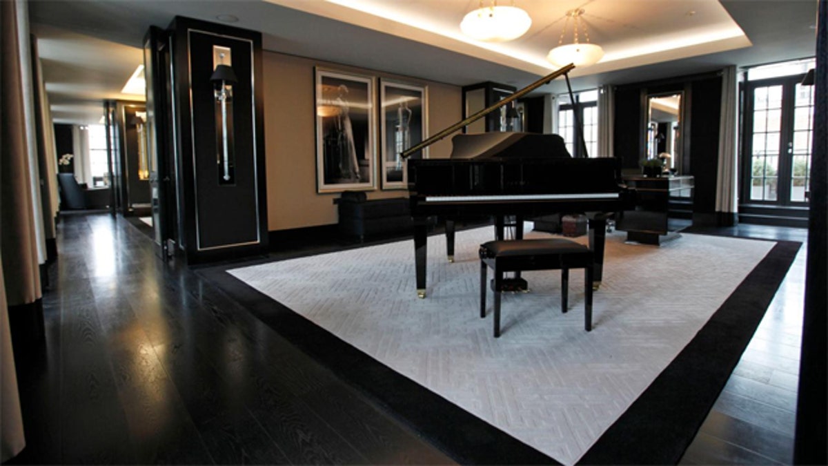 March, 16, 2012: A reception room with baby grand piano and large desk in one of the five bedroom luxury penthouse apartments overlooking Hyde Park.