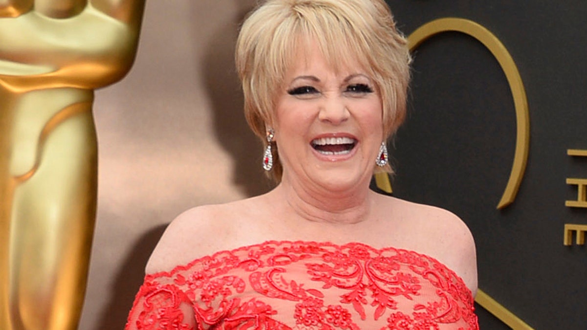 This March 2, 2014, file photo shows Lorna Luft at the Oscars in Los Angeles. Singer Luft, the daughter of Judy Garland, collapsed backstage after a concert in London, Friday, March 9, 2018, and was rushed to the hospital, where she was undergoing tests, a representative said.
