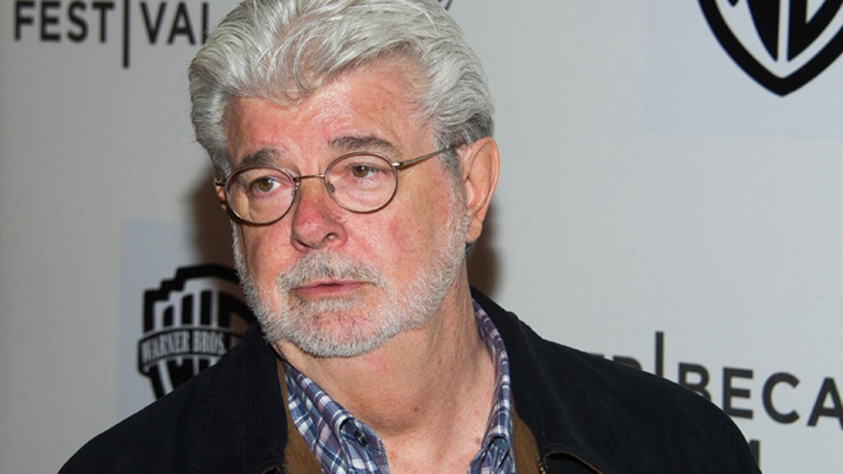 FILE - In this April 17, 2015 file photo, filmmaker George Lucas attends the Tribeca Film Festival in New York. Chicago Mayor Rahm Emanuel says Lucas has abandoned plans to build his art museum in Chicago after a legal challenge from a parks group. Emanuel released a statement Friday June 24, 2016, calling it a 