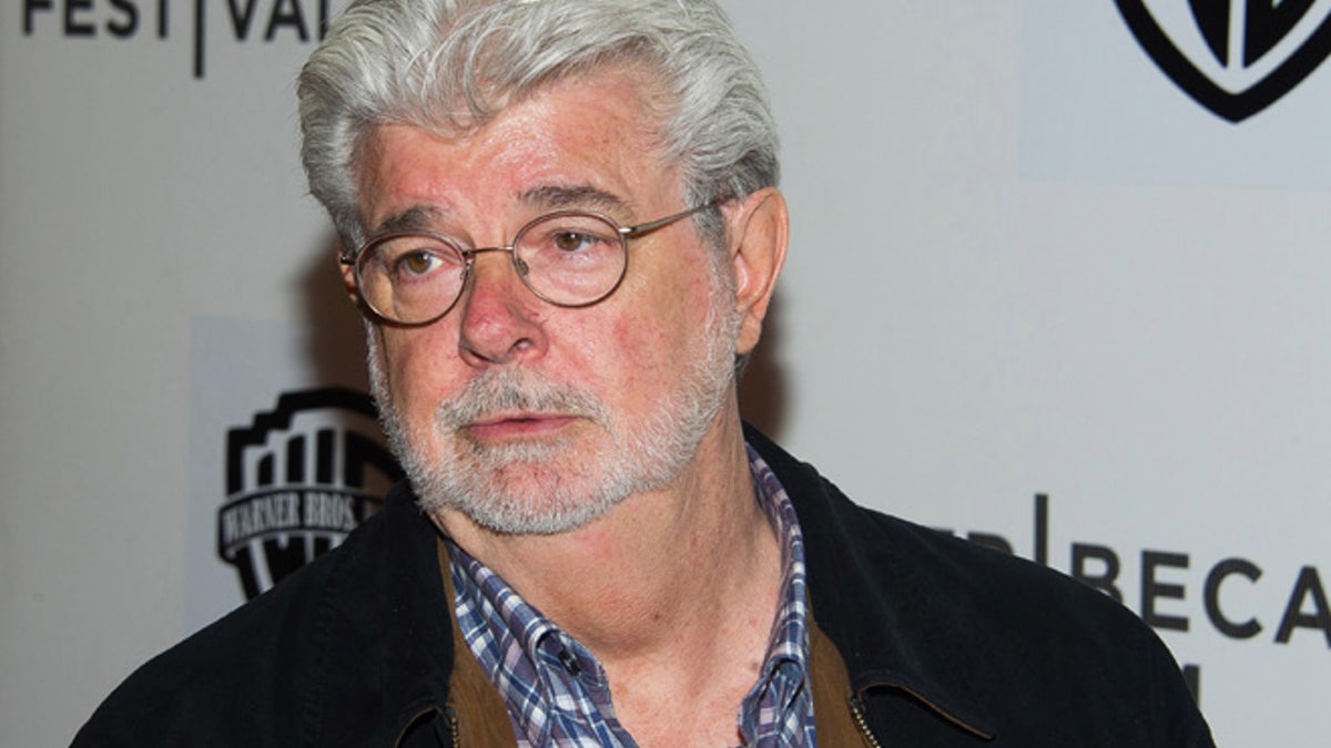 FILE - In this April 17, 2015 file photo, filmmaker George Lucas attends the Tribeca Film Festival in New York. Chicago Mayor Rahm Emanuel says Lucas has abandoned plans to build his art museum in Chicago after a legal challenge from a parks group. Emanuel released a statement Friday June 24, 2016, calling it a