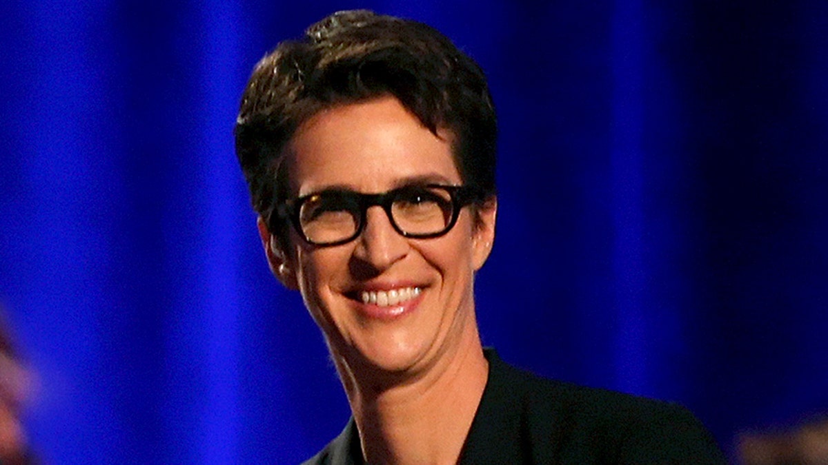 Democratic presidential candidates Hillary Clinton (L), Bernie Sanders (2nd L), Martin O'Malley (2nd R) and television host Rachel Maddow (R) wave to the crowd following the First in the South Presidential Candidates Forum held at Winthrop University in Rock Hill, South Carolina November 6, 2015. REUTERS/Chris Keane - GF20000049073