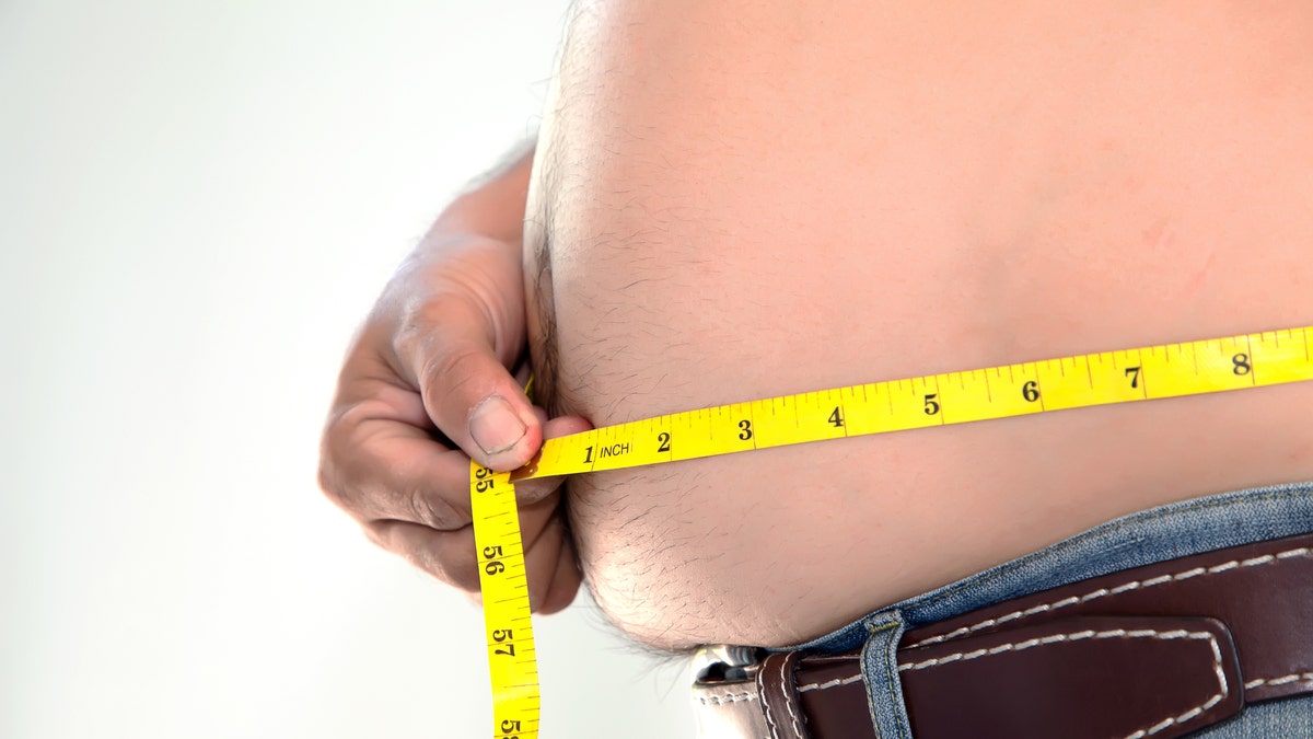 man belly fat obese obesity istock large