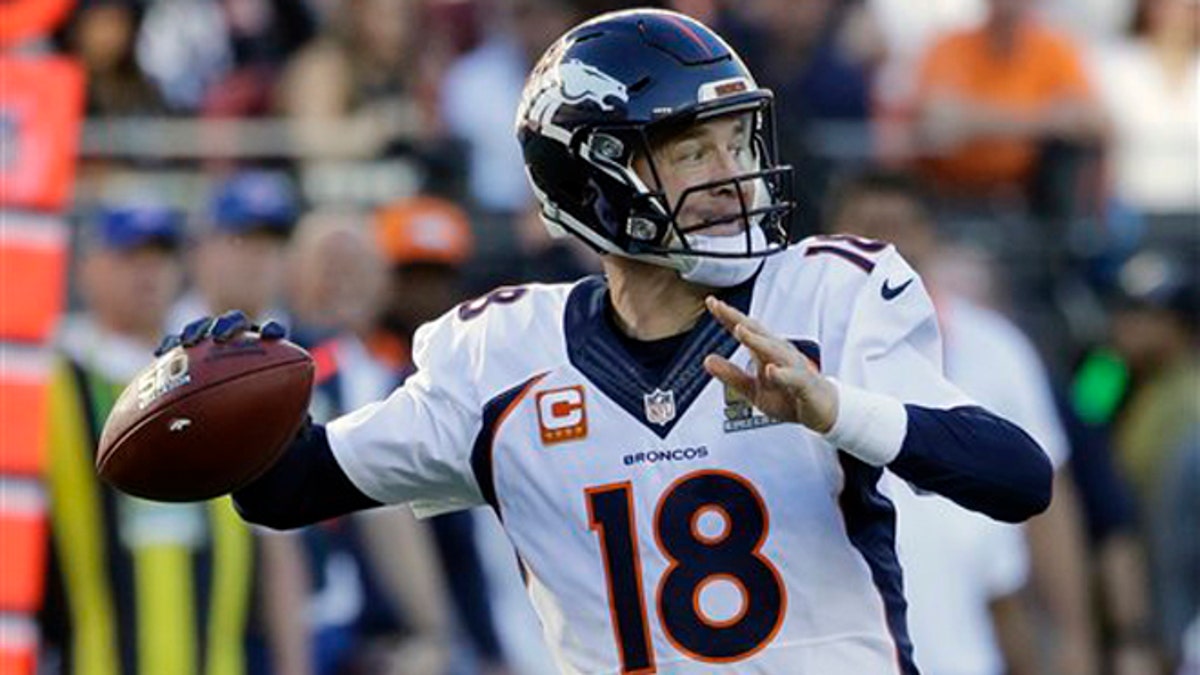 Denver Broncos Peyton Manning (18) throws during the first half of the NFL Super Bowl 50 football game against the Carolina Panthers Sunday, Feb. 7, 2016, in Santa Clara, Calif. (AP Photo/Gregory Bull) 