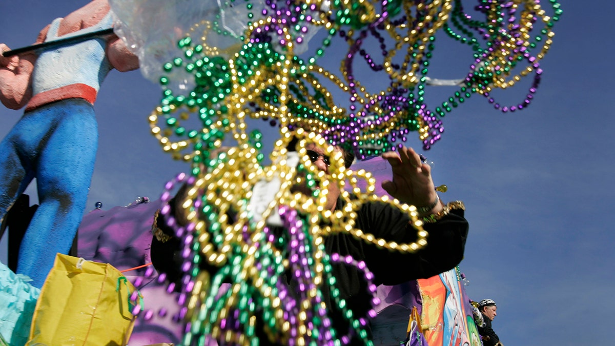 throwing mardi gras beads