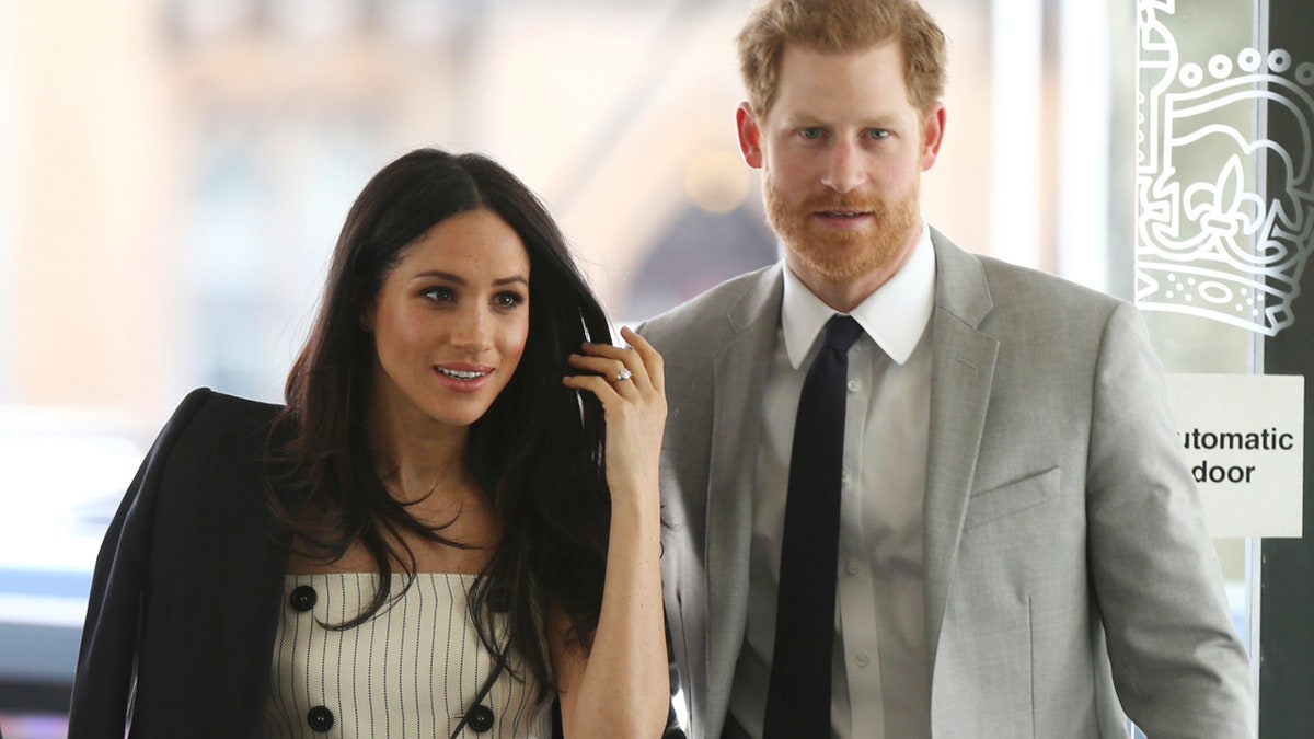 Britain's Prince Harry and Meghan Markle attend a reception for the Commonwealth Youth Forum at the Queen Elizabeth II Conference Centre, London, during the Commonwealth Heads of Government Meeting, Wednesday April 18, 2018. (Yui Mok/Pool via AP)