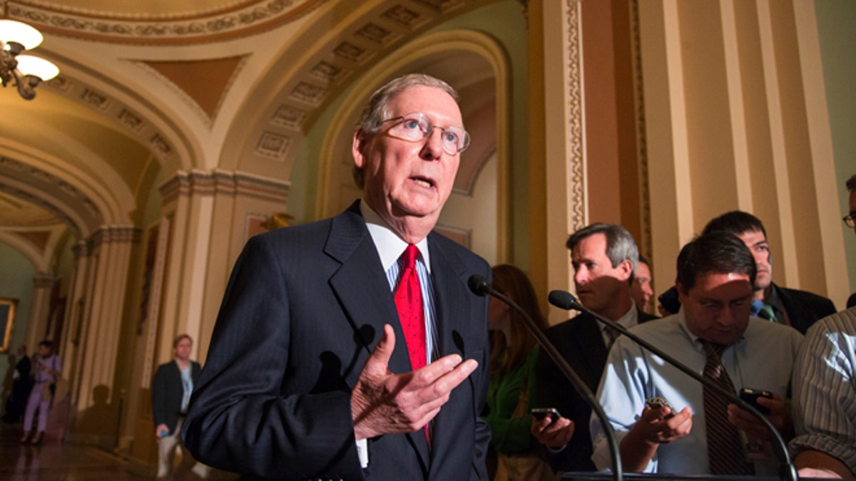 Sept. 17, 2013: Senate Minority Leader Mitch McConnell, R-Ky., speaks to reporters following a Republican caucus at the Capitol in Washington. 