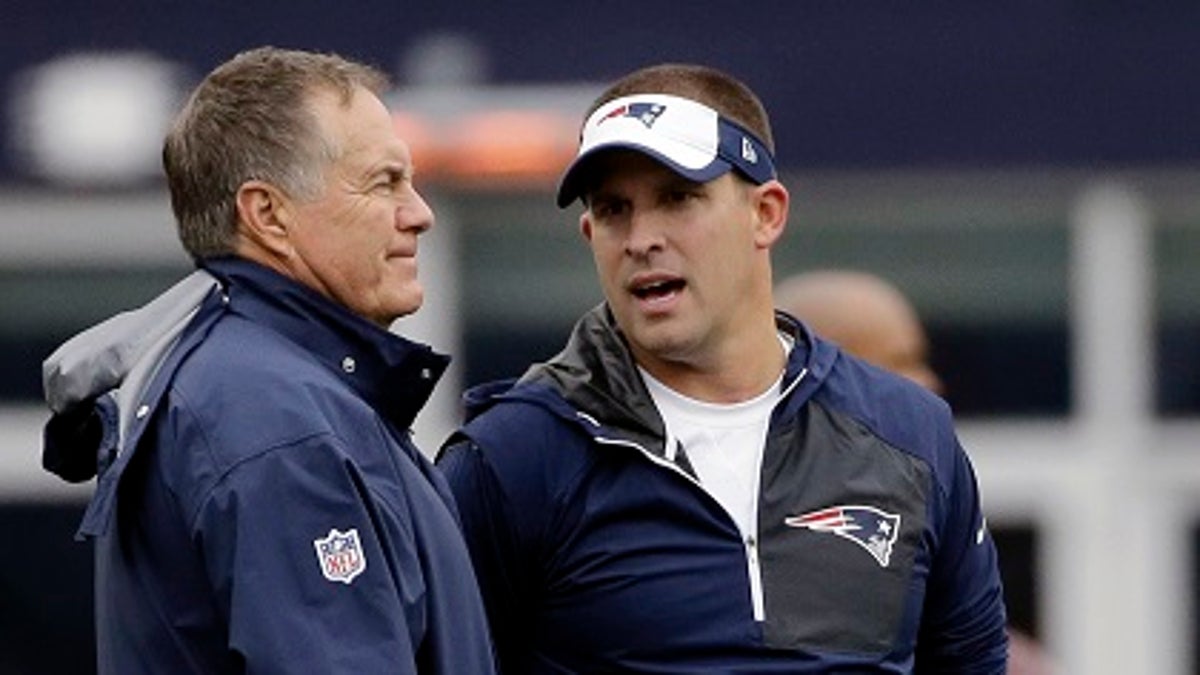 FILE - In this Oct. 2, 2016, file photo, New England Patriots head coach Bill Belichick, left, and offensive coordinator Josh McDaniels talk before an NFL football game against the Buffalo Bills in Foxborough, Mass. The Indianapolis Colts announced Tuesday, Feb. 6, 2018, that hey have hired Josh McDaniels as their new head coach. (AP Photo/Elise Amendola, File)