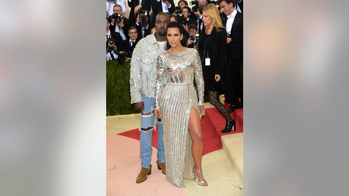Kanye West, left, and Kim Kardashian arrive at The Metropolitan Museum of Art Costume Institute Benefit Gala, celebrating the opening of "Manus x Machina: Fashion in an Age of Technology" on Monday, May 2, 2016, in New York. (Photo by Charles Sykes/Invision/AP)