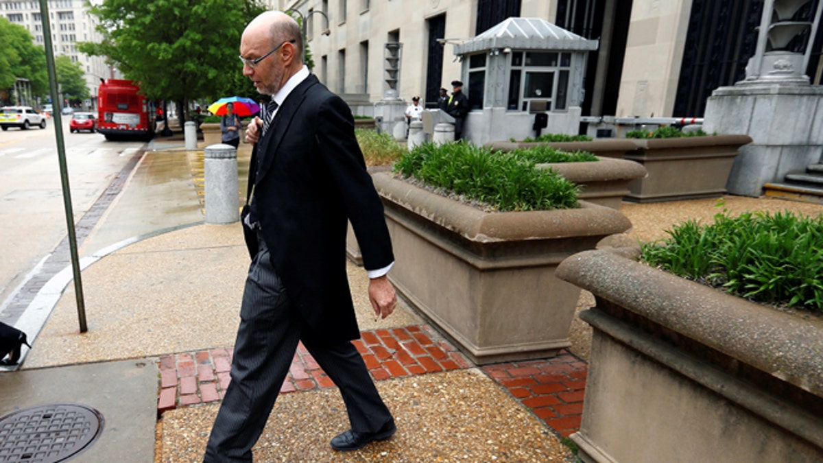 U.S. Deputy Solicitor General Michael Dreeben departs the U.S. Justice Department in traditional morning coat on his way to argue his one-hundredth case before the U.S. Supreme Court in Washington, U.S. April 27, 2016. REUTERS/Jonathan Ernst SEARCH 