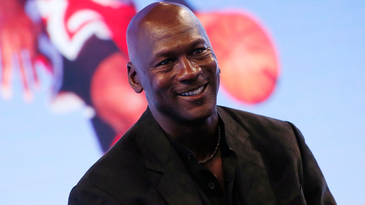 Former basketball great Michael Jordan delivers a speech as he attends a party celebrating the 30th anniversary of the Air Jordan shoe line in Paris, France June 12, 2015.   REUTERS/Gonzalo Fuentes - PM1EB6C1FCQ01