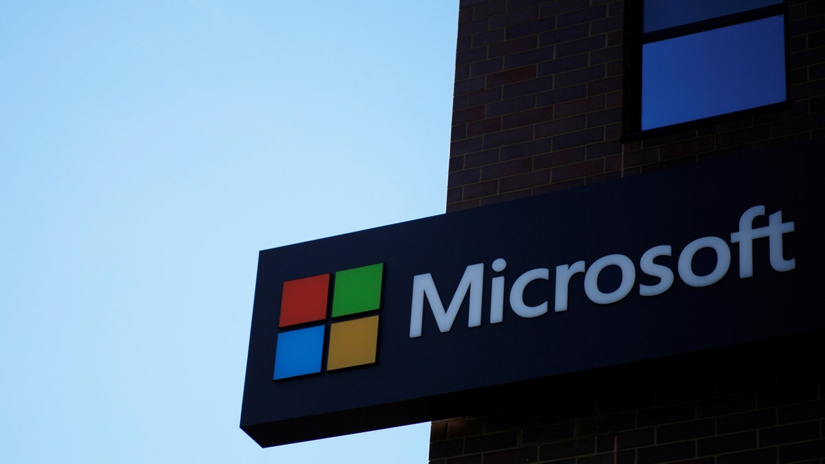 A sign marks the Microsoft office in Cambridge, Massachusetts, U.S. January 25, 2017.   REUTERS/Brian Snyder - RTSXCIW