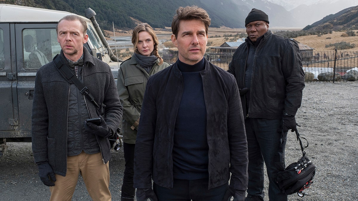 This image released by Paramount Pictures shows, from left, Simon Pegg, Rebecca Ferguson, Tom Cruise and Ving Rhames in a scene from 