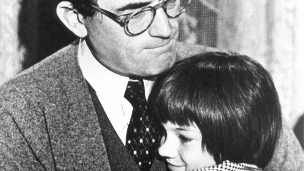 Gregory Peck embraces Mary Badham   Performing