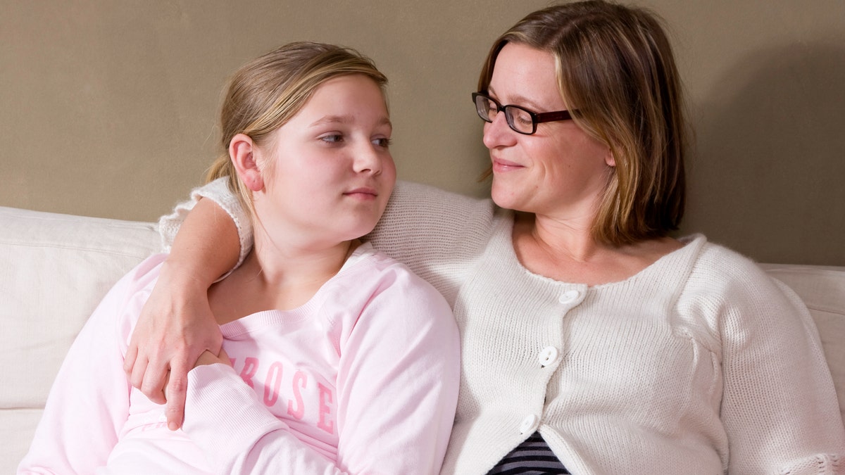 mom and teen talking talking to teenager parent and daughter istock large