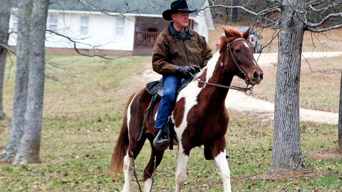 Moore on horse