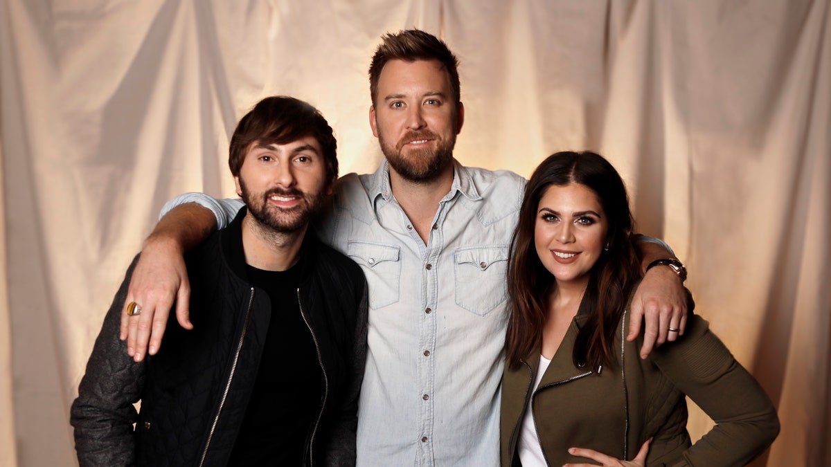 InIn this Jan. 9, 2017, photo, the members of Lady Antebellum, from left, Dave Haywood, Charles Kelley and Hillary Scott pose in Nashville, Tenn. The Grammy-winning vocal group released a new single, âYou Look Good,â Thursday, Jan. 19, from their forthcoming album âHeart Break,â which comes out on June 9. (AP Photo/Mark Humphrey)