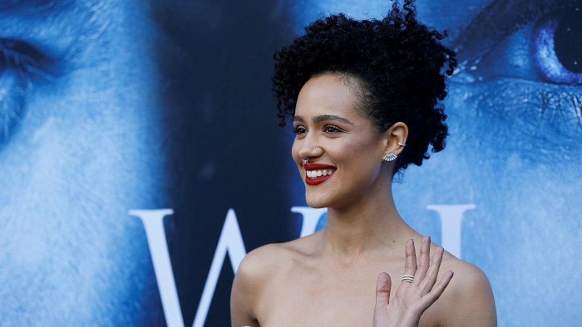 Cast member Nathalie Emmanuel poses at a premiere for season 7 of the television series 