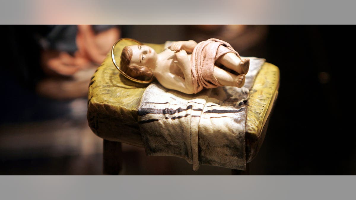 WASHINGTON - DECEMBER 9:  A scuplture of a baby Jesus that is part of a nativity scene from Spain is displayed during a 