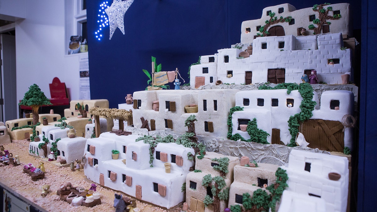 Nativity scene fruit cake 2 SWNS