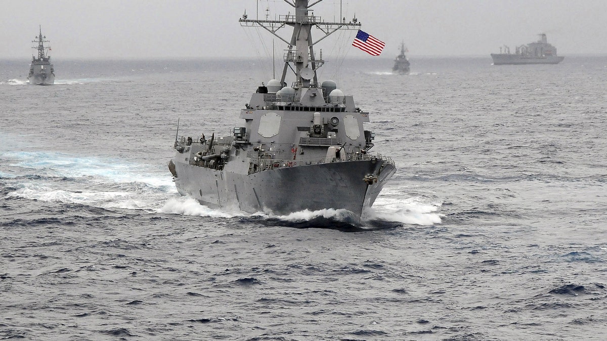 The US Navy guided-missile destroyer USS Lassen, which sailed within 12 nautical miles of artificial islands built by China in the South China Sea on October 27, 2015, is pictured in the Pacific Ocean in a November 2009 photo provided by the U.S. Navy. US Navy/CPO John Hageman/Handout via Reuters/File Photo ATTENTION EDITORS - FOR EDITORIAL USE ONLY. NOT FOR SALE FOR MARKETING OR ADVERTISING CAMPAIGNS. THIS IMAGE HAS BEEN SUPPLIED BY A THIRD PARTY. IT IS DISTRIBUTED, EXACTLY AS RECEIVED BY REUTERS, AS A SERVICE TO CLIENTS FROM THE FILES PACKAGE - SEARCH "SOUTH CHINA SEA FILES" FOR ALL IMAGES - RTX2K9DK