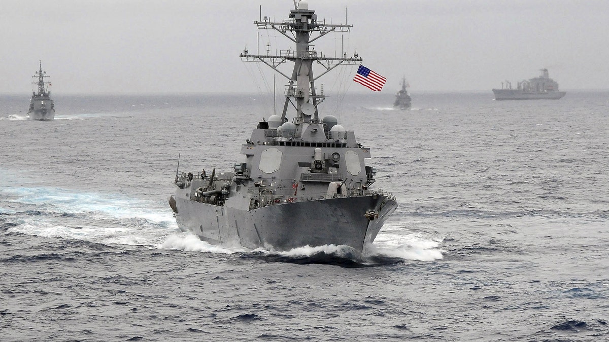 The US Navy guided-missile destroyer USS Lassen, which sailed within 12 nautical miles of artificial islands built by China in the South China Sea on October 27, 2015, is pictured in the Pacific Ocean in a November 2009 photo provided by the U.S. Navy. US Navy/CPO John Hageman/Handout via Reuters/File Photo ATTENTION EDITORS - FOR EDITORIAL USE ONLY. NOT FOR SALE FOR MARKETING OR ADVERTISING CAMPAIGNS. THIS IMAGE HAS BEEN SUPPLIED BY A THIRD PARTY. IT IS DISTRIBUTED, EXACTLY AS RECEIVED BY REUTERS, AS A SERVICE TO CLIENTS FROM THE FILES PACKAGE - SEARCH "SOUTH CHINA SEA FILES" FOR ALL IMAGES - RTX2K9DK