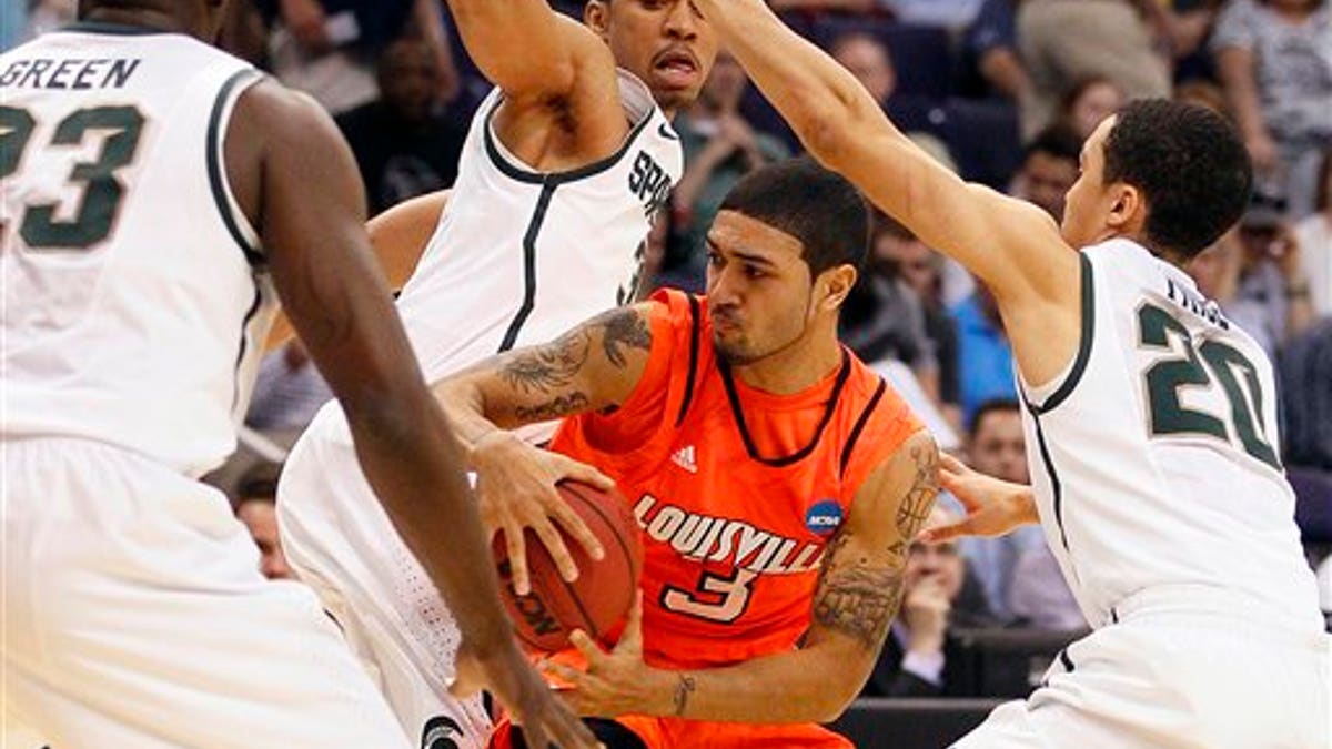 NCAA Louisville Michigan St Basketball