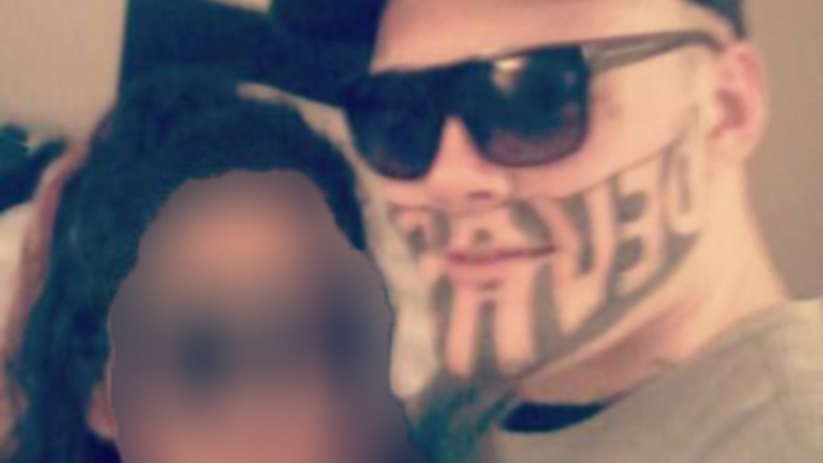 Man with Devast8 tattoo covering his face gets a job