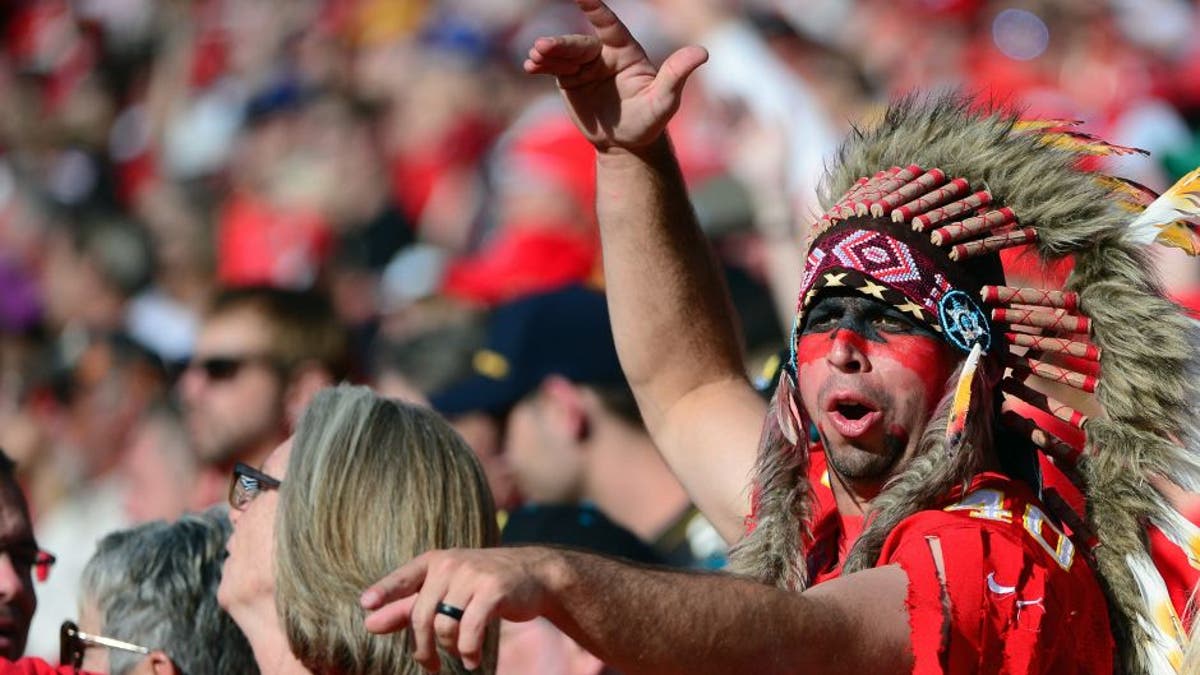 Nov 6, 2016; Kansas City, MO, USA; A Kansas City Chiefs fan cheers on his team during the second half against the Jacksonville Jaguars at Arrowhead Stadium. The Chiefs won 19-14. Mandatory Credit: Jeff Curry-USA TODAY Sports