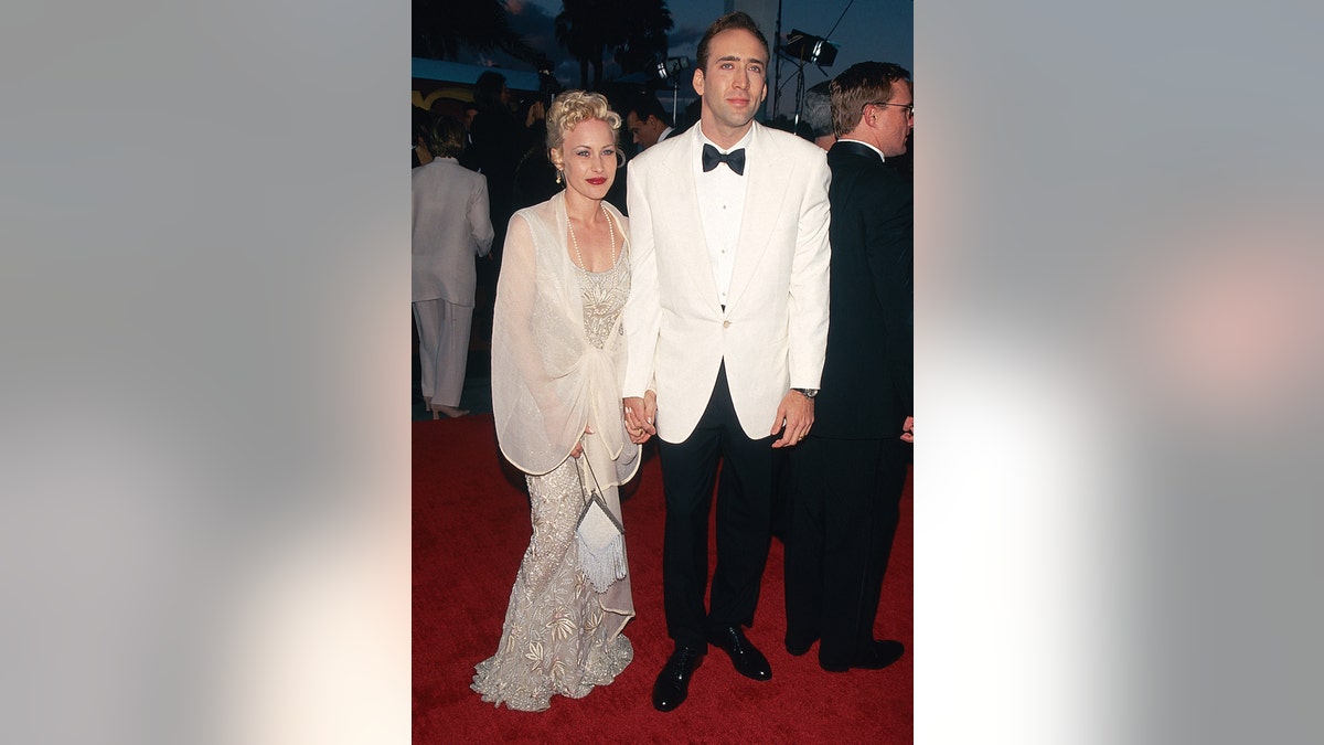 Actress Patricia Arquette and actor Nicolas Cage arrive at the 1996 Screen Actors Guild Awards. This photo appears on page 180 in Frank Trapper's RED CARPET book. (Photo by Frank Trapper/Corbis via Getty Images)
