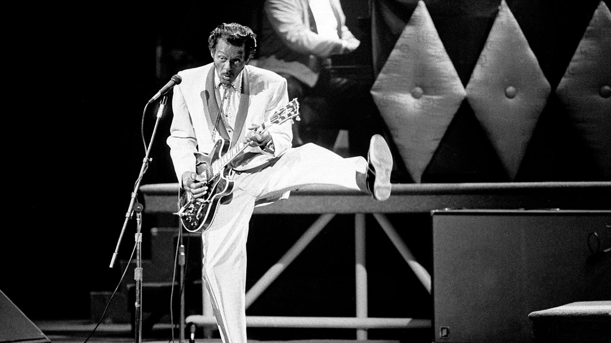 Chuck Berry performs during a concert celebration for his 60th birthday at the Fox Theatre in St. Louis, Mo., Oct. 17, 1986. The concert is being filmed for a motion picture documentary titled "Chuck Berry Hail! Hail! Rock 'n' Roll."