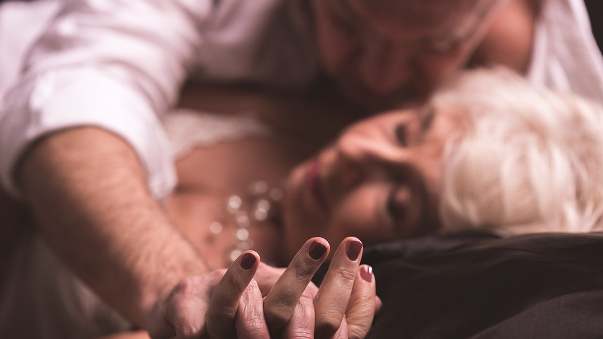 older couple in bed