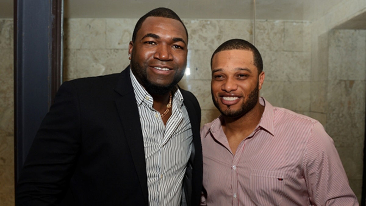 Boston Red Sox wearing David Ortiz (gold crown) T-shirts ahead of