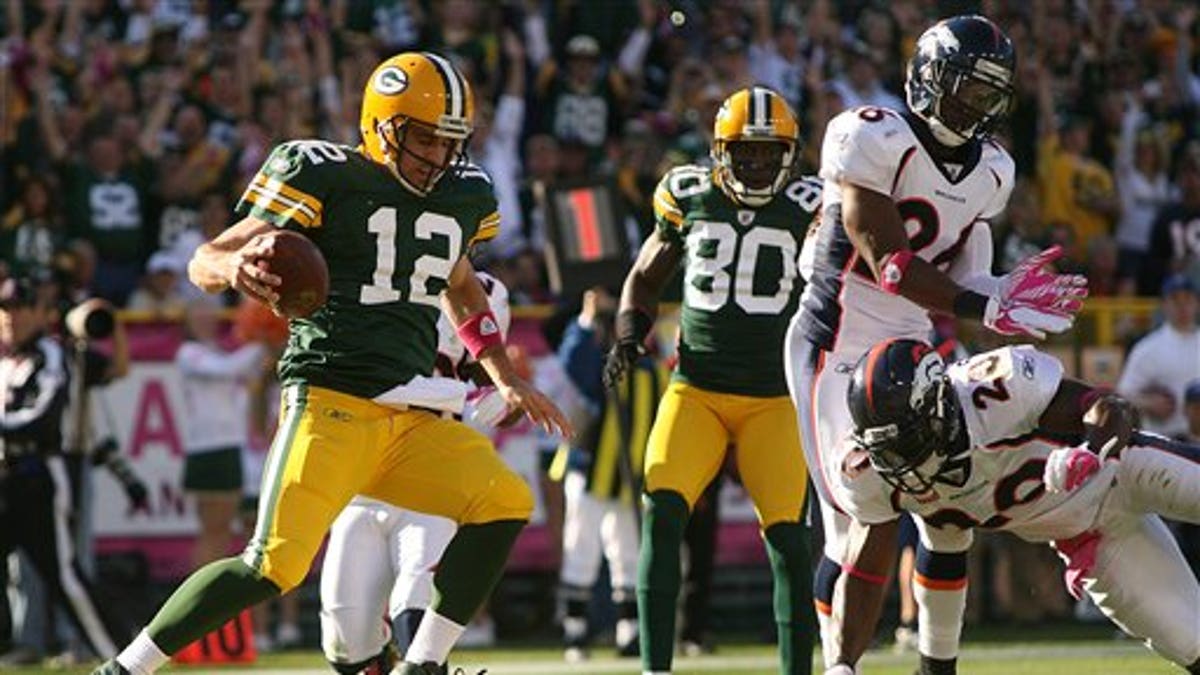 Broncos Packers Football