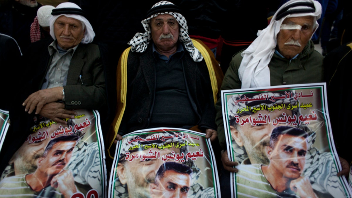 a4c174de-Mideast Israel Palestinians