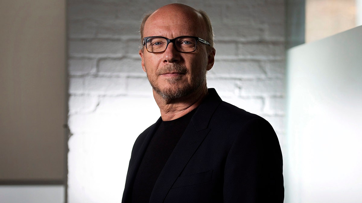 FILE - In this Sept. 6, 204 file photo, director Paul Haggis poses for a photo in Toronto during the 2014 Toronto International Film Festival. A December 2017 civil lawsuit charging the Oscar-winning filmmaker with rape has prompted three other women to come forward with their own accusations, including a publicist who says he forced her to perform oral sex, then raped her. Haggis has denied the allegations in the lawsuit, and when asked about the new accusations, his lawyer said, 