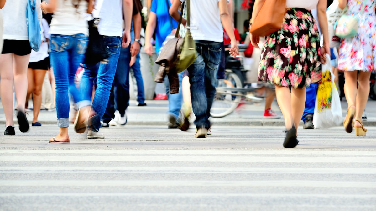 pedestrians crosswalk walking istock large