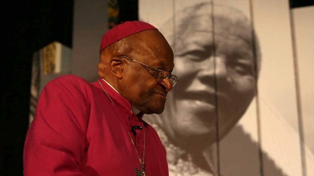 South Africa's Nobel Peace Prize laureate Desmond Tutu attends the launch of Cape Town???s Nelson Mandela Legacy Exhibition on July 30, 2013. Tutu Thursday pleaded with Mandela's family not to "besmirch" his name after they engaged in a public spat fuelled by a legal dispute over a burial site.