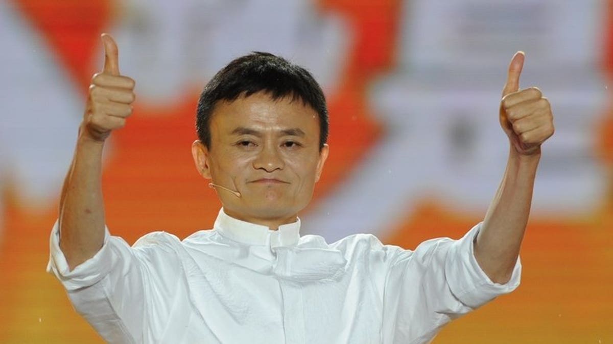 Alibaba founder Jack Ma thanks the crowd after speaking in Hangzhou, on May 10, 2013. Activists have called on Ma to apologise over remarks in which he appeared to condone the bloody Tiananmen Square crackdown in 1989.