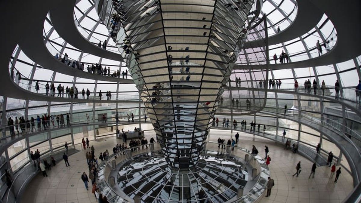 Visitors stand inside the cupola of the German Bundestag (lower house of parliament) in Berlin.