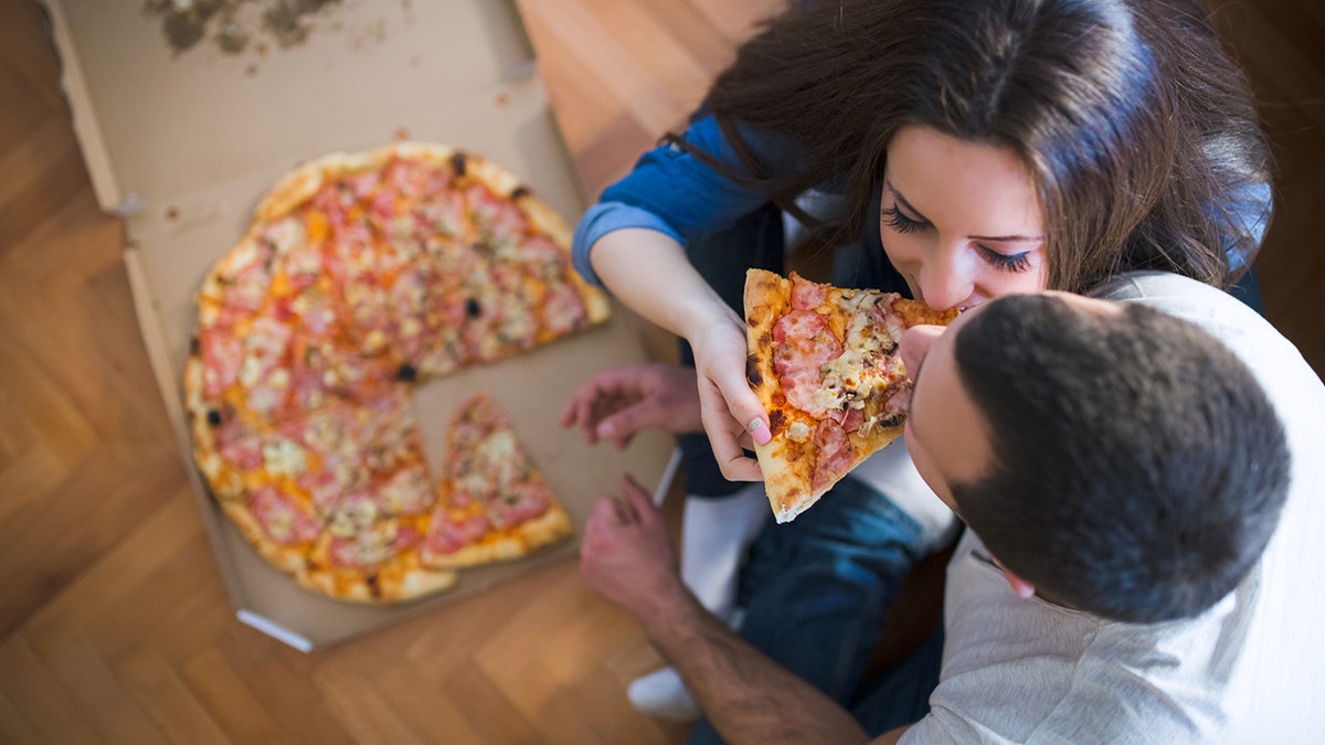 pizza couple istock