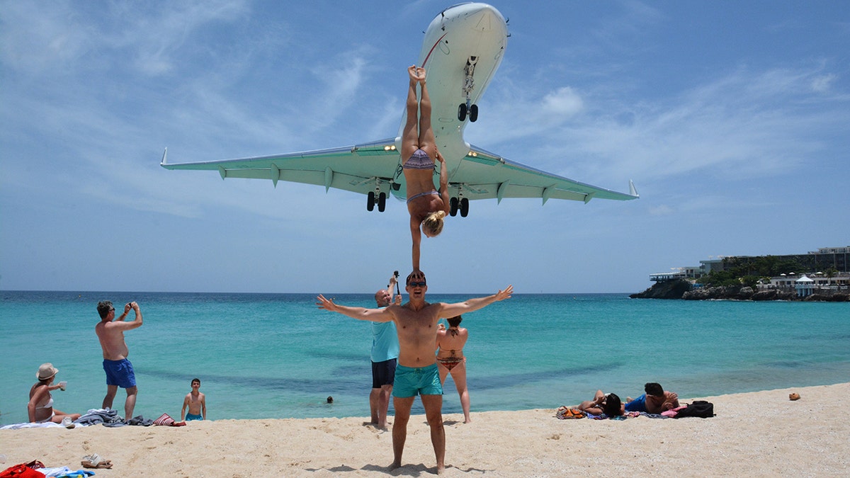 maho beach couple 1 swns