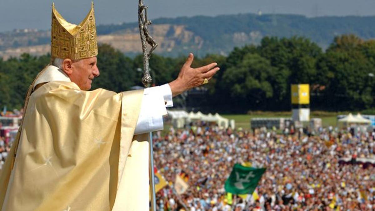 In this Sept. 12, 2006, file photo, Pope Benedict XVI waves to the crowd at the end of a papal Mass in Regensburg, southern Germany, about 75 miles northeast of Munich. 