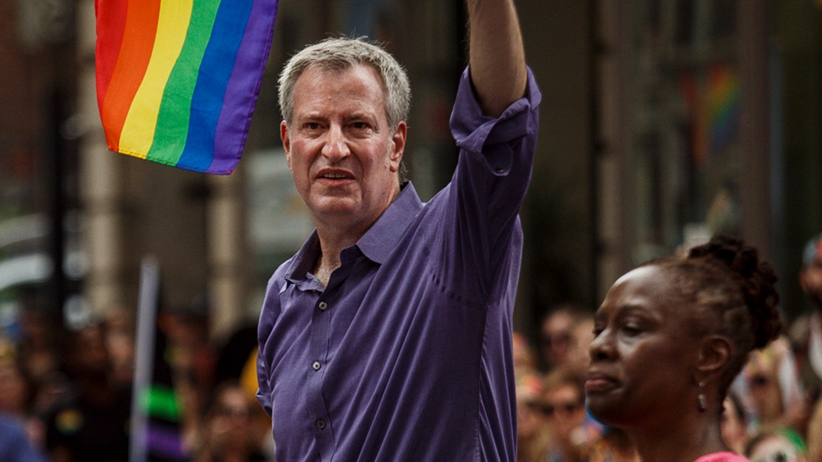 Celebration, defiance mix at New York City gay pride parade